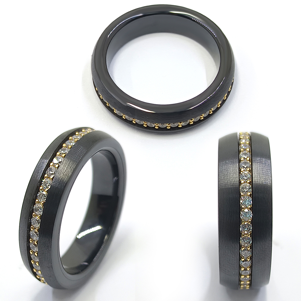 Anillo de cerámica negra Truegold con baño de plata Cz y oro